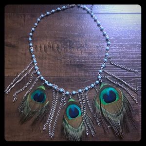 Unique peacock feather necklace a head turner 🦚💜